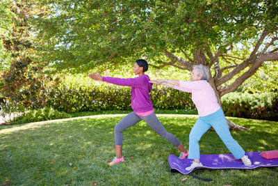 elderly stretching outside